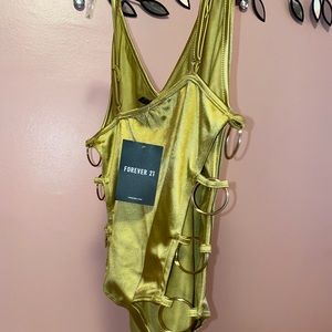 Women’s Gold champagne body suit Gold hoops on side